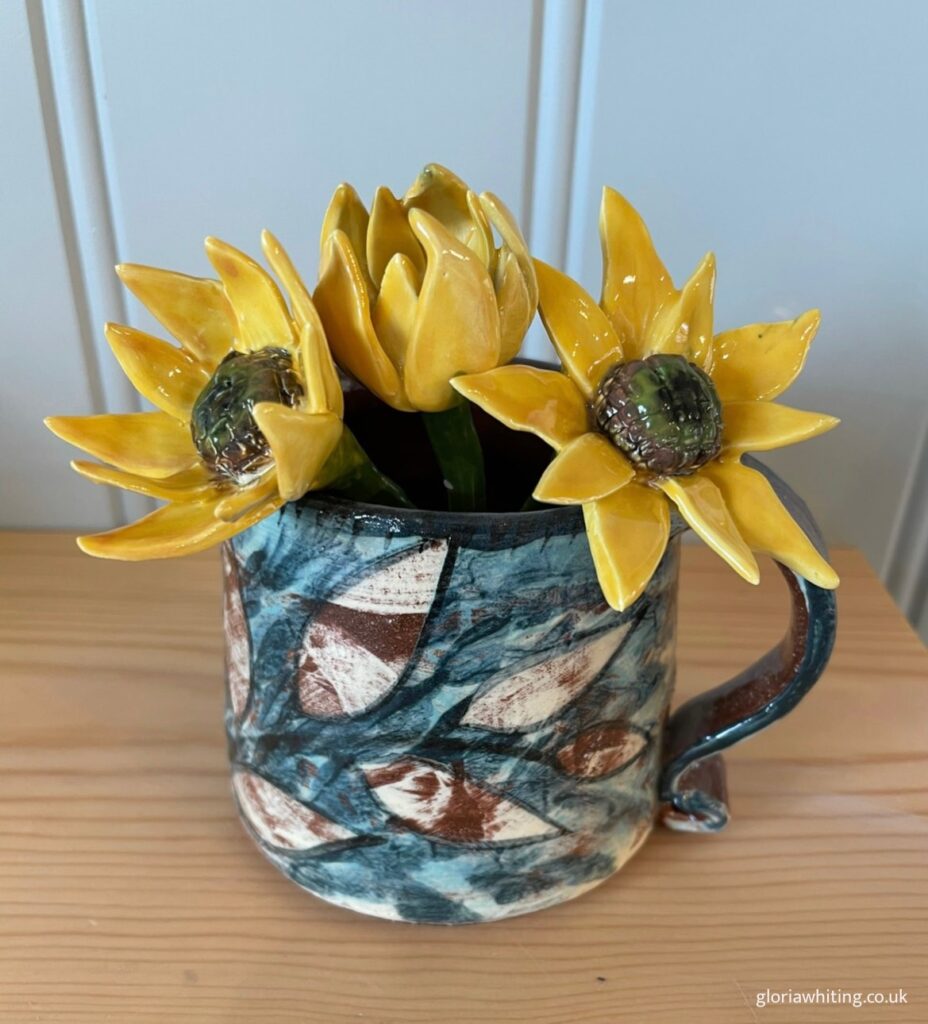 mug with ceramic flowers